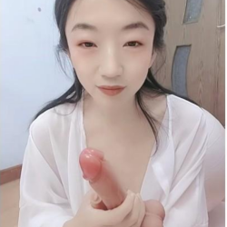 An elegant, mature woman was rocking back and forth on a yoga ball, playing with a vibrating egg, making particularly suggestive noises